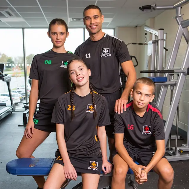 group of youths in branded teamwear
